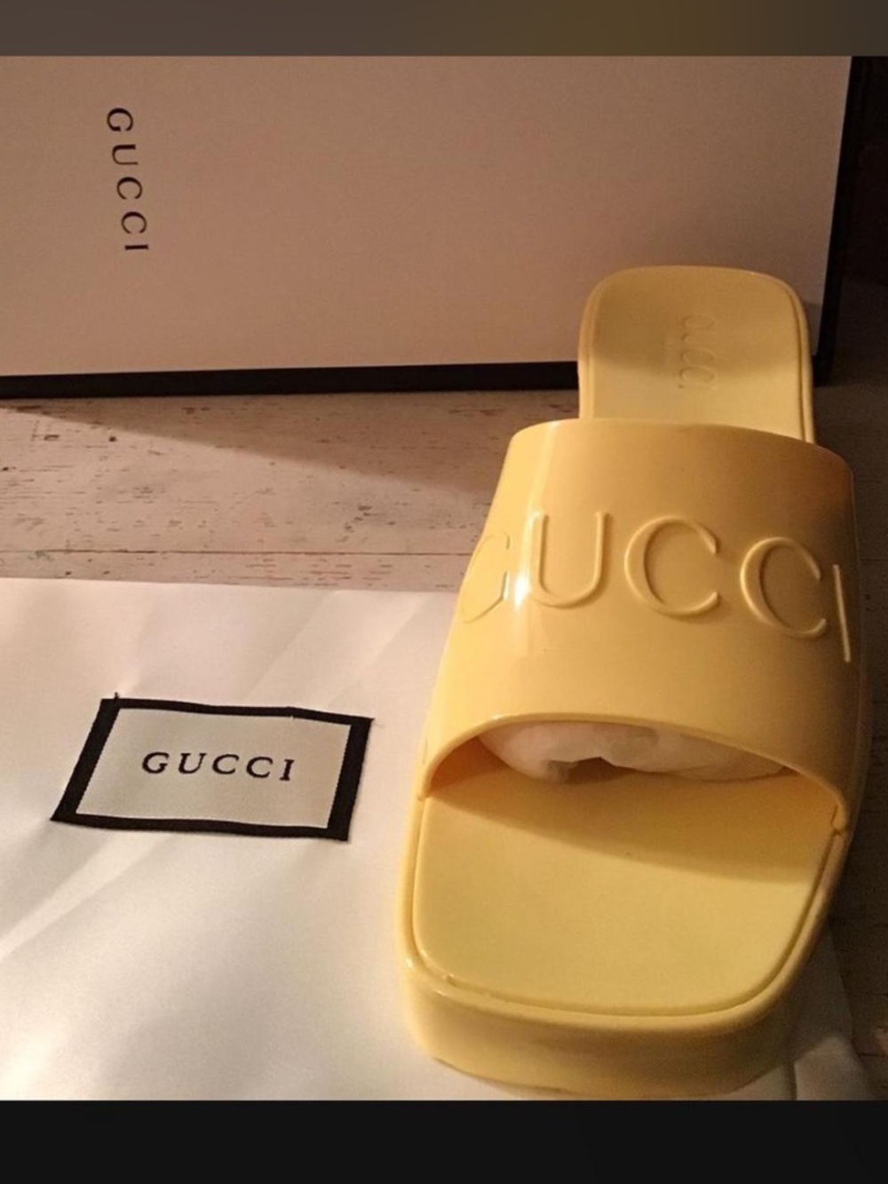 Gucci Pale Yellow Embossed Logo Slide